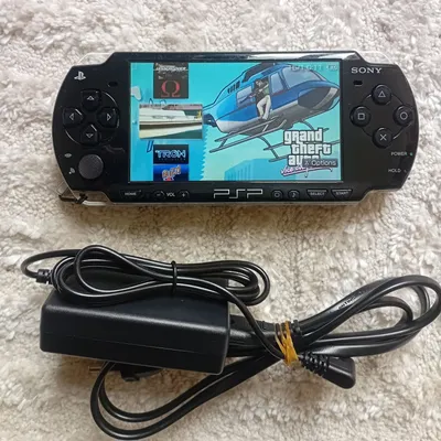 Psp slim 2004 / 64Gb / 1000 jeux